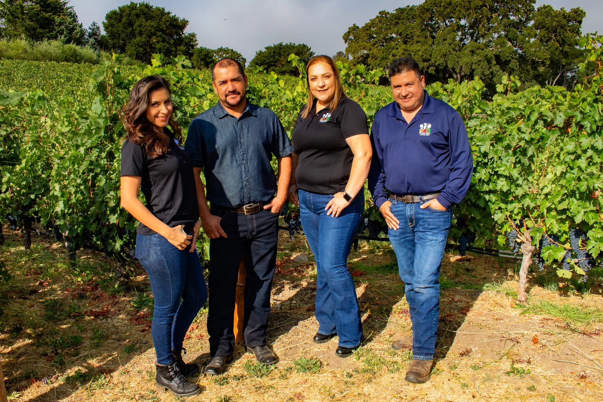 Pearls Farm Labor leadership team standing together in a vineyard